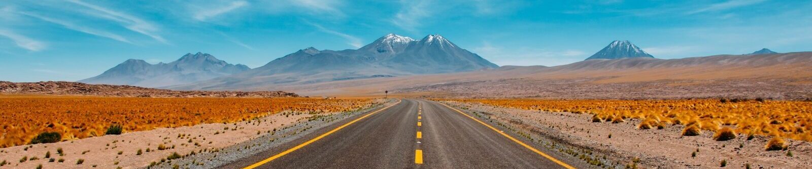 lone road going to mountains